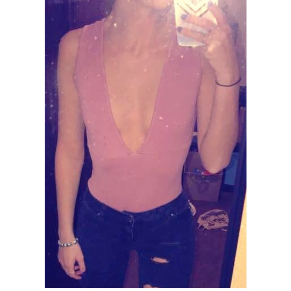 Light pink body suit
